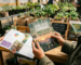 Guide reading “Semillas de Cannabis Chile Guía 2026” held in a greenhouse